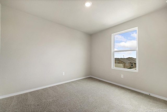 view of carpeted spare room