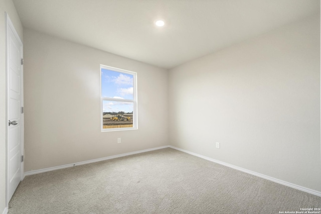 spare room with carpet floors