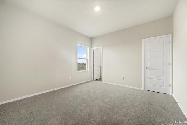 spare room with carpet