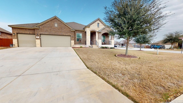 view of front facade with a garage and a front yard