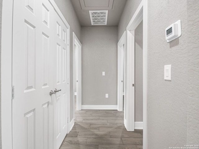 hallway featuring dark wood-type flooring