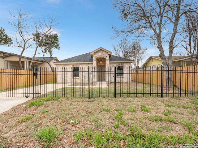 single story home featuring a front yard