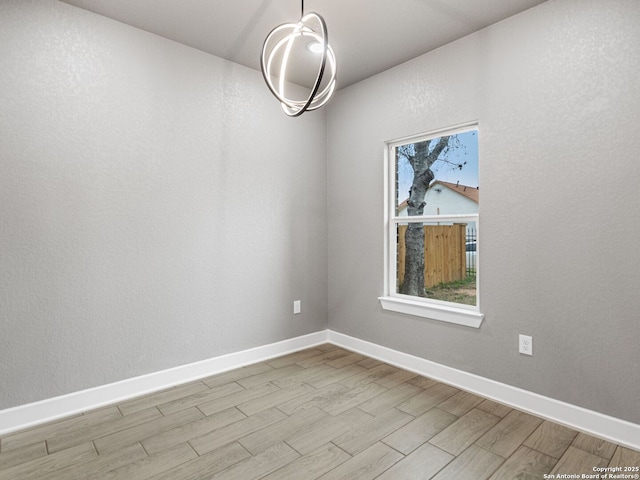 spare room featuring light hardwood / wood-style floors