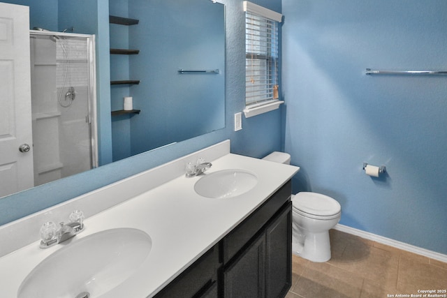 bathroom with tile patterned flooring, a shower, vanity, and toilet