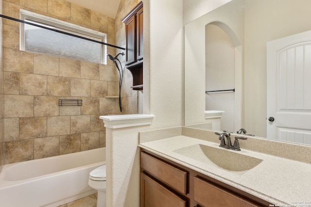 full bath featuring tub / shower combination, vanity, toilet, and tile patterned floors