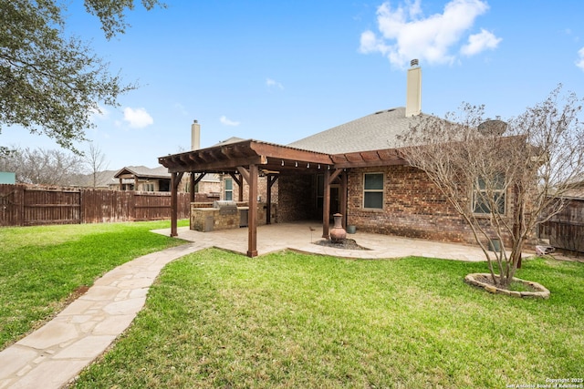 rear view of house featuring a fenced backyard, brick siding, area for grilling, a pergola, and a patio area