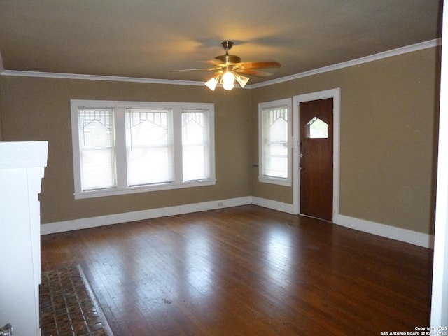 foyer with ceiling fan, crown molding, and dark hardwood / wood-style floors