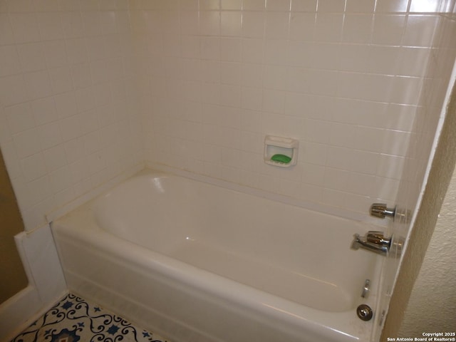 bathroom with tile patterned floors