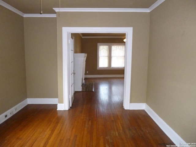 hall featuring crown molding and dark hardwood / wood-style flooring