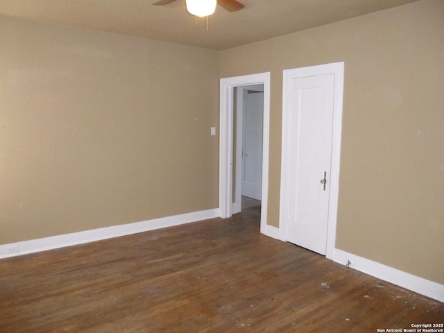 unfurnished room featuring ceiling fan and wood-type flooring