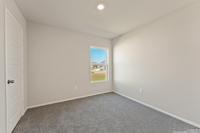 1836 Charlie Cv, San Antonio, TX 78221 - unfurnished room with dark colored carpet