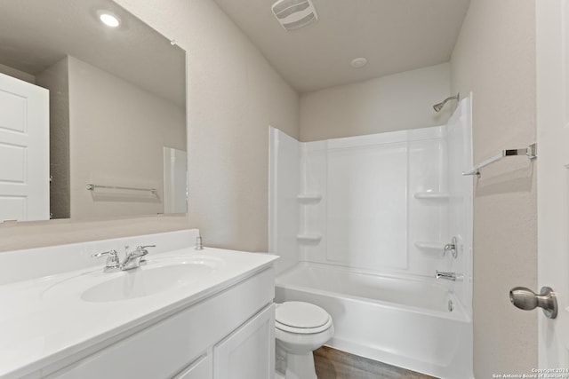 1836 Charlie Cv, San Antonio, TX 78221 - full bathroom featuring washtub / shower combination, toilet, vanity, and hardwood / wood-style flooring