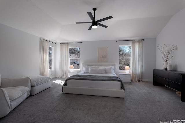 bedroom featuring lofted ceiling, ceiling fan, and carpet floors