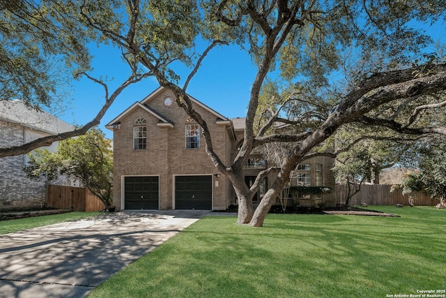 view of front of home with a garage and a front lawn