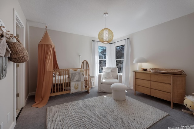 bedroom with dark colored carpet