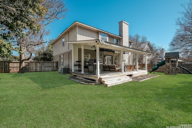 rear view of property with an outdoor living space, a playground, cooling unit, and a lawn