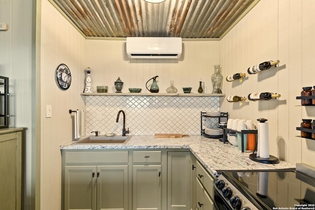 kitchen with open shelves, tasteful backsplash, electric range, a sink, and a wall mounted air conditioner