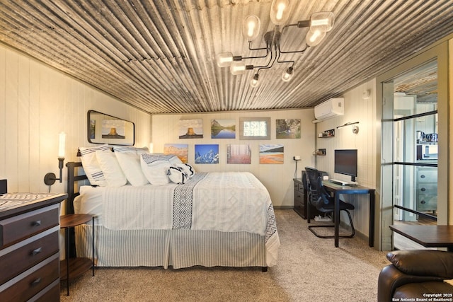 bedroom featuring a wall unit AC, an inviting chandelier, and carpet floors