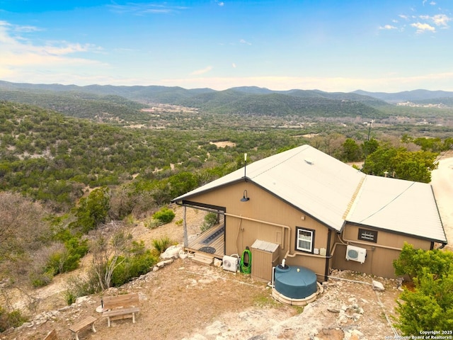 birds eye view of property featuring a mountain view