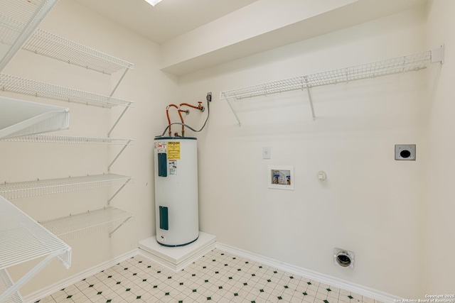 washroom with washer hookup, water heater, and hookup for an electric dryer