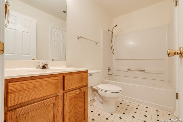 full bathroom with toilet, bathing tub / shower combination, and vanity