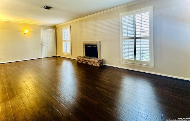 unfurnished living room featuring a fireplace, ornamental molding, and dark wood-type flooring