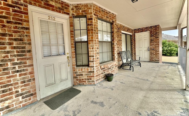 doorway to property with a porch