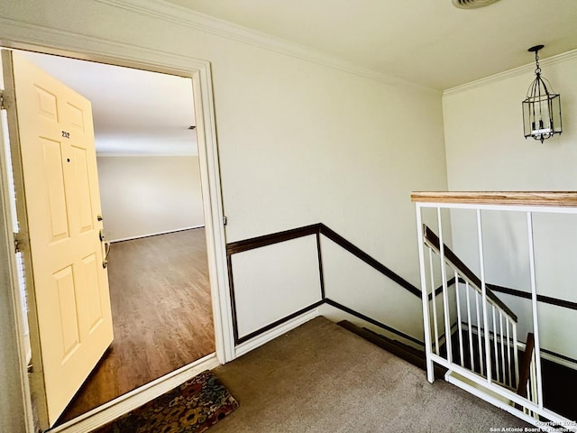 stairway with crown molding