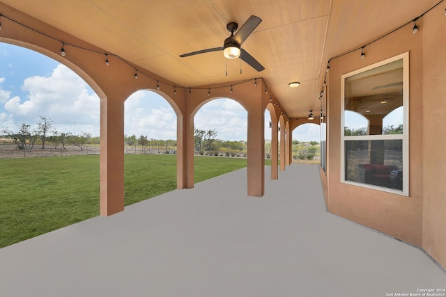 view of patio with ceiling fan