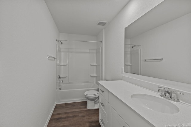 full bathroom featuring shower / bath combination, vanity, toilet, and hardwood / wood-style floors