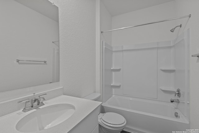 full bathroom with bathtub / shower combination, toilet, and vanity