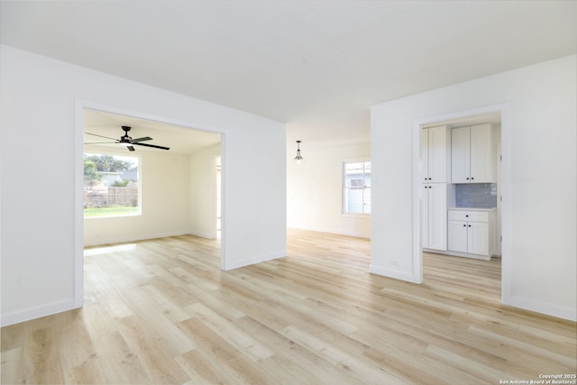 spare room featuring light hardwood / wood-style flooring