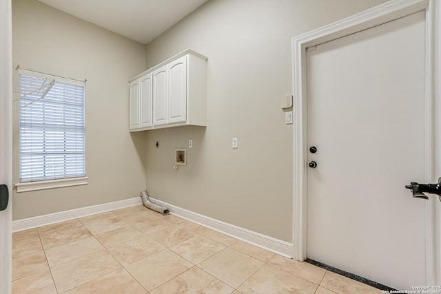 laundry room featuring light tile patterned flooring, cabinets, hookup for an electric dryer, and hookup for a washing machine