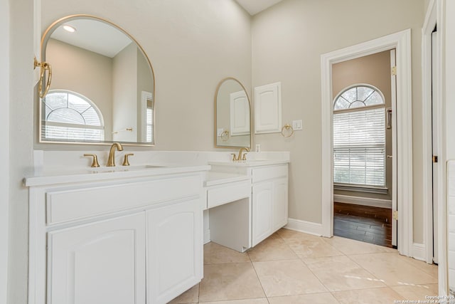 bathroom featuring tile patterned floors and vanity