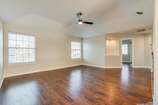 spare room featuring ceiling fan, lofted ceiling, and dark hardwood / wood-style flooring