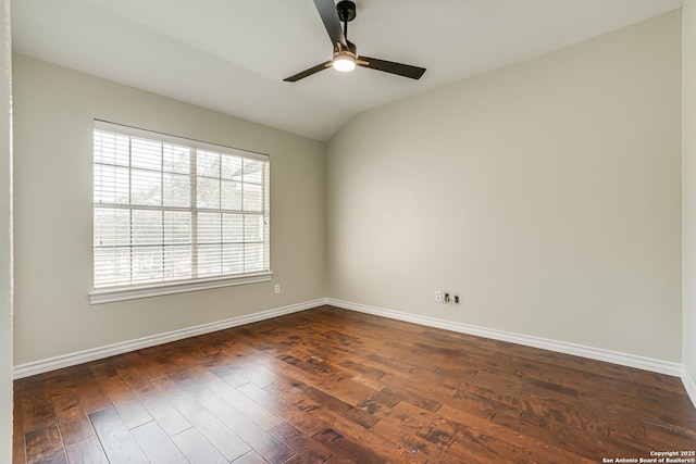 spare room featuring lofted ceiling, ceiling fan, and dark hardwood / wood-style floors