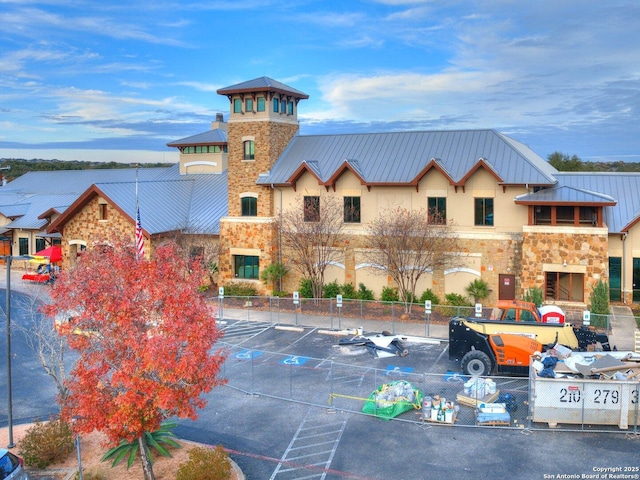 view of building exterior featuring fence