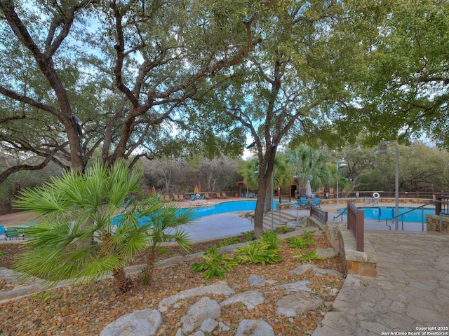 pool with a patio