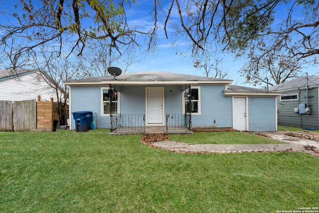 ranch-style house with a front lawn