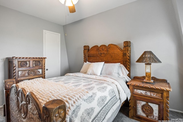 bedroom with ceiling fan and carpet floors