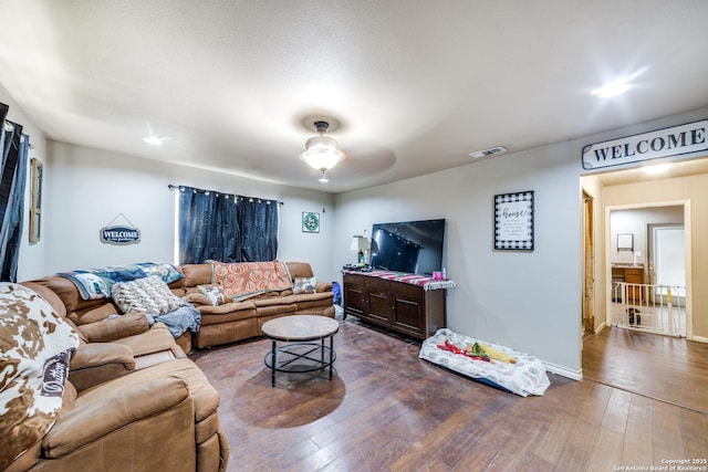 living room featuring dark hardwood / wood-style floors