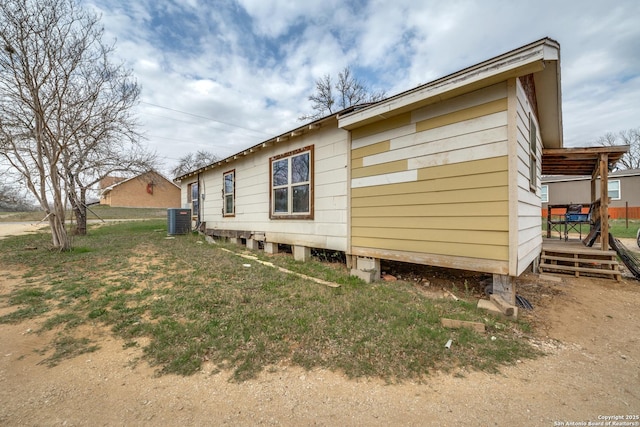 view of home's exterior featuring central air condition unit