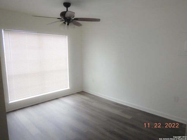 empty room featuring hardwood / wood-style flooring and ceiling fan