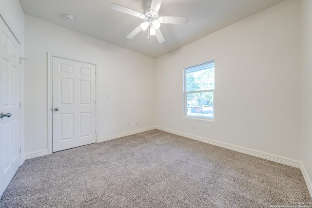 5023 Stockman Dr, San Antonio, TX 78247 - carpeted spare room with baseboards and ceiling fan