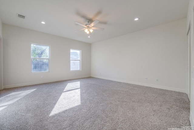 5023 Stockman Dr, San Antonio, TX 78247 - carpeted spare room featuring visible vents, baseboards, a ceiling fan, and recessed lighting