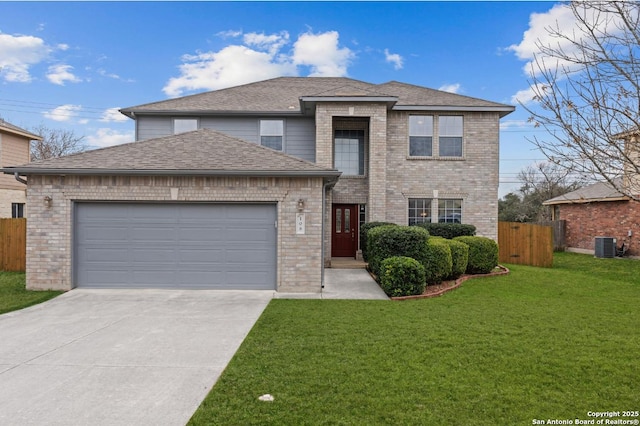 front of property with a front lawn, central AC unit, and a garage