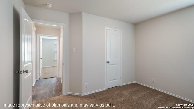 unfurnished bedroom with carpet flooring