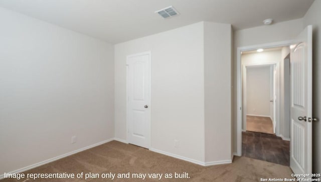 unfurnished bedroom with carpet floors