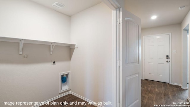 laundry area with dark hardwood / wood-style flooring, gas dryer hookup, and hookup for an electric dryer