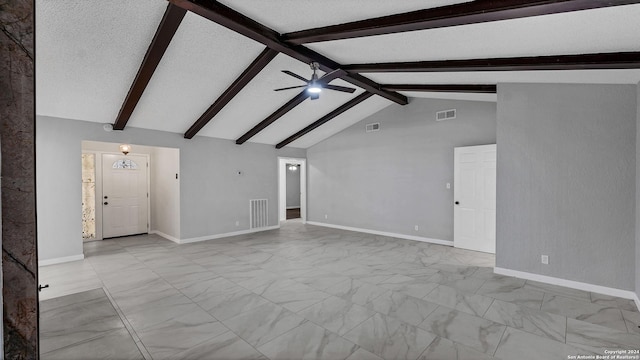 unfurnished living room with vaulted ceiling with beams, ceiling fan, and a textured ceiling